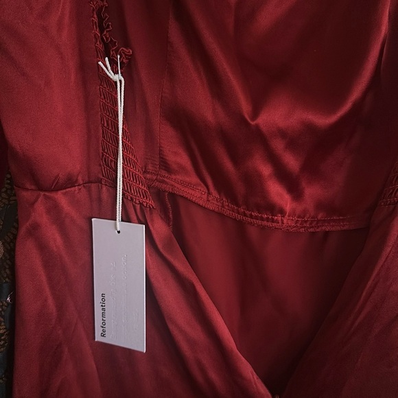 Red silk Reformation Solvang dress in size 6 - midi length with slit. - Picture 8 of 8